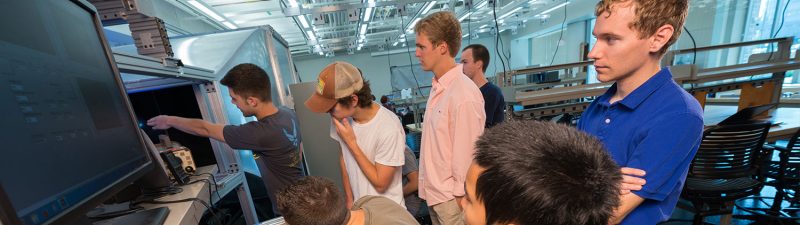 Students collaborate in an laboratory environment in the Kevin T. Crofton Department of Aerospace and Ocean Engineering. 