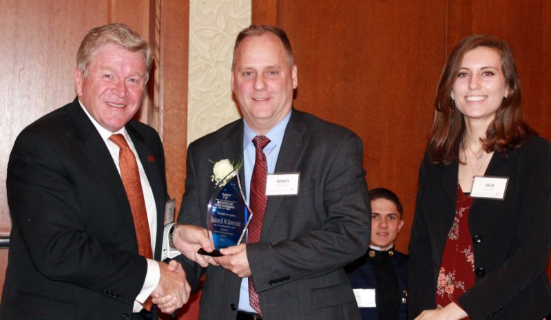 Rodney Bowersox is presented his award by Eric Paterson and Julie Duetsch