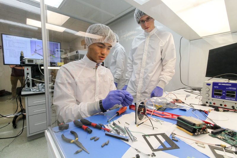 Students work on manufacturing and assembly of Virginia Tech’s CubeSat satellite at Space@VT. 