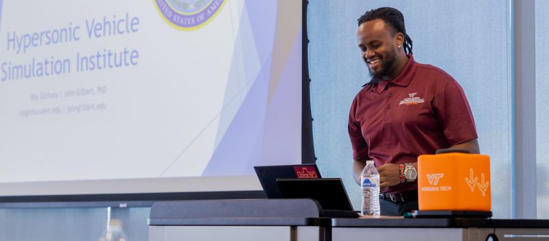 Student presenting at a lecturn