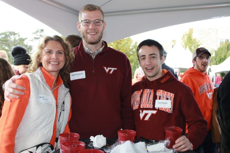 three alumni at a VT tailgate