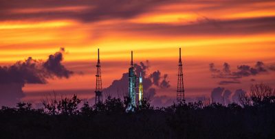 A golden sunrise surrounds NASA’s Space Launch System and Orion spacecraft for Artemis I on the pad at Launch Complex 39B at NASA’s Kennedy Space Center in Florida on Aug. 22, 2022
