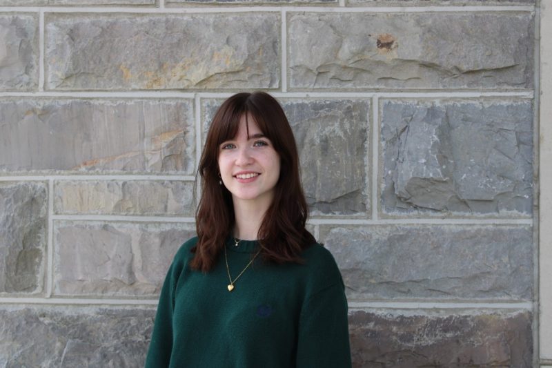 Anna Barker against Hokie Stone wall