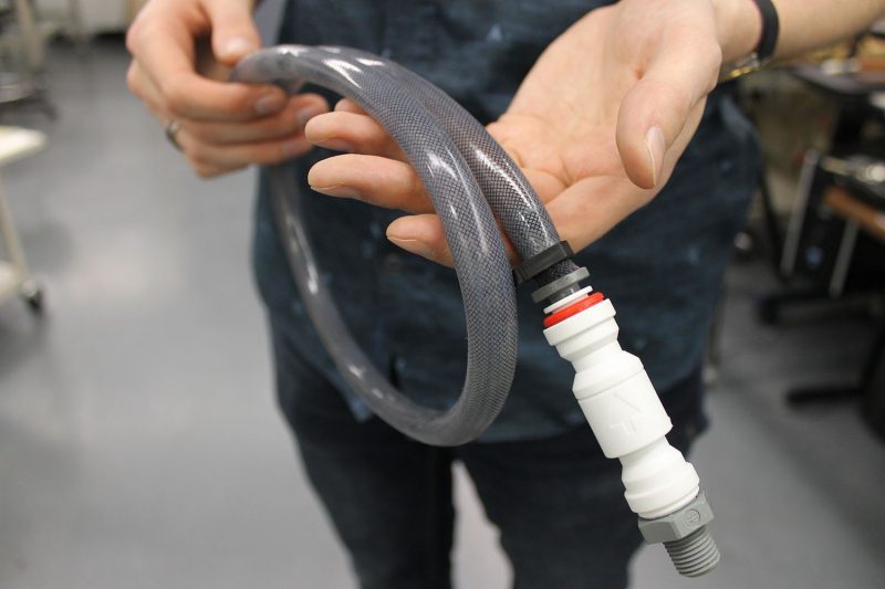 A tube pump made of fluidic flexible composite material is shown as a small scale model for experimentation